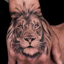 75 Best Lion Tattoos For Men 2020 Guide Mens Lion Tattoo Lion Hand Tattoo Lion Hand Tattoo Men