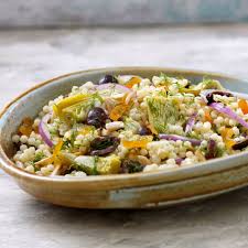 Diced cucumbers, juicy tomatoes, and bell peppers give this salad the perfect crunch. Mediterranean Pearl Couscous Salad From Atco Blue Flame Kitchen
