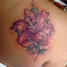 Accurate recreations of disney princesses, vibrant watercolor designs and meticulous stipple shading all demonstrate the diversity of modern tattoo design and with such a beautiful and meaningful flower as inspiration it is little surprise that a lily tattoo design can be so successful. Tattoo Uploaded By Stacie Mayer Watercolor Lily Tattoo By Clare Lambert Watercolor Clarelambert Lily Flower 131313 Tattoodo