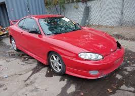 Image result for Electric Red 2005 Tiburon