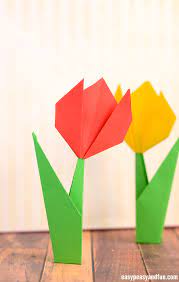 This tutorial explains how to make a traditional origami lily from one sheet of paper. How To Make Origami Flowers Origami Tulip Tutorial With Diagram Easy Peasy And Fun