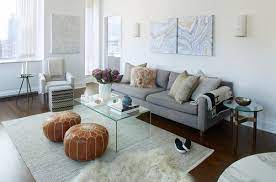 It is best to use larger, less expensive, rugs over small expensive rugs. 10 Secret Tricks To Make Your Living Room Look Expensive