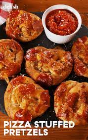 These Mozzarella Stuffed Pizza Pretzels Are Absolutely Insane Recipe Recipes Pizza Stuffed Pretzel Recipe Pizza Recipes