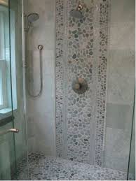 Zen bathroom themes are one of the trending interior décor ideas that have been doing the rounds lately. Bali Cloud Pebble Tile Shower Remodel Rock Shower Rock Shower Ideas