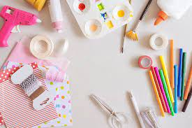 Top View Of Various Crafting Tools On White Surface By Alita Ong For Stocksy United Craft Tools Wallpaper Crafts Crafts