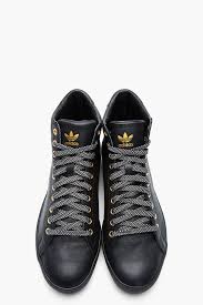 Black And Gold Adidas High Tops Adidas Originals By O C Black And Gold Leather Rod Laver Vintage Mid Tops Sneakers Men Shoes Mens Sneaker Boots