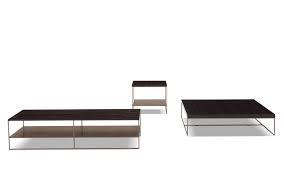 Lower shelf is covered in tightly woven rattan peel. Calder Bronze Coffee Tables En