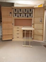 Crafting Cabinet With Fold Out Work Table Craft Storage Cabinets Diy Craft Room Fold Out Table
