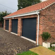 They are also optimally sealed with flexible and. Sectional Garage Doors Howlett Garage Doors