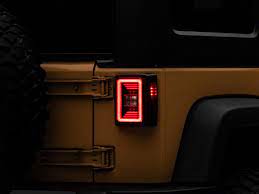 Wrangler led lighting turns any wrangler lighting system from a boring set of incandescent bulbs into a lighting powerhouse, that will not only keep you safe. Raxiom Jeep Wrangler Jl Style Led Tail Lights J133626 07 18 Jeep Wrangler Jk