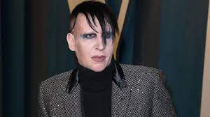Marilyn manson will turn himself in to the los angeles police department as part of an agreement between the gilford police department and manson's camp, according to gilford police chief. Marilyn Manson S Ex Assistant Sues Over Sexual Assault And Battery Claims Bbc News