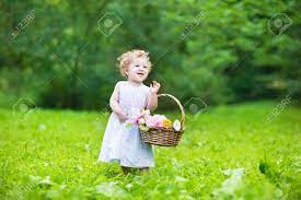 If you have a garden of your own that you want to show off, have the party at your house. Beautiful Baby Girl Walking In A Sunny Garden With A Flower Basket Stock Photo Picture And Royalty Free Image Image 29701760