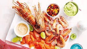 Luxurious lobster, oysters on ice, prawns on the barbie and silky smoked salmon generously draped over anything. Seafood Platter Recipe Coles