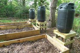 Flow rates will vary, depending on the size of your water container and the elevation of it. How To Make An Amazing Rain Barrel System To Water Your Garden The Homestead Survival Rain Barrel System Rain Barrel Survival Gardening