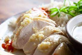 Poach a whole chicken till it's slightly pink at the bone, use the broth and fat to many ingredients are repeatedly used, but i have to list them so you may easily work through the recipe. Hainanese Chicken Rice Recipe A Family Recipe Steamy Kitchen