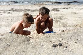 The blue liquid seen on the picture is azov sea. Brothers Playing On Beach Of Sea Of Azov Stock Photo Picture And Royalty Free Image Image 130444863