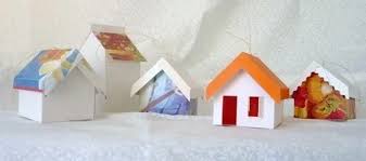 Using leftover shipping boxes, fold a strip of cardboard to make the front, bottom and back of a window box. Pinwheel Ponders Greeting Card Village Paper House Ornaments