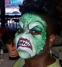 This cool monster face painting was painted