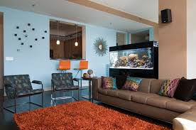 22 Contemporary Living Room Designs With Fish Tanks Home Design Lover Placing a fish tank near a room heater such as a radiator will also cause you problems with water all fish tank equipment is made with water in mind but other equipment in a child's bedroom may fish like most, if not all living things produce waste which if left untreated produces some horrible chemicals.