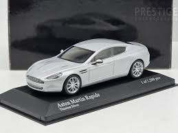 Image result for Titanium Silver 2010 Aston Martin