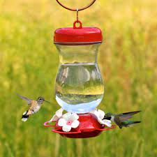 However, because glass has a tendency to break more easily when dropped, be sure to these feeders are securely hung on a pole or hanging hook that is somewhat shielded. Perky S Finest 24 Oz Top Fill Glass Hummingbird Feeder 132tf