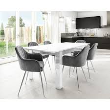 In a dining room where walls can feel a little bare, the more texture, the better—even without hanging elaborate. White Extendable Dining Table With 6 Grey Tub Chairs Seats 6 Furniture123