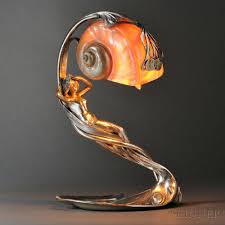 Art Nouveau Figural Table Lamp With Shell Shade Sale Number 2661b Lot Number 82 Skinner Auctioneers Art Nouveau Lighting Art Nouveau Lamps Art Deco Lamps