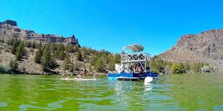 The day is hot and humid; Party Barging On Lake Billy Chinook Travel Oregon