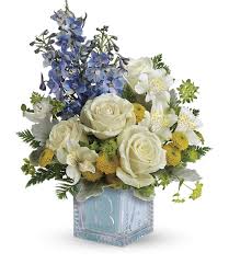 Put your mind at ease, our flowers and plants are always professionally wrapped and delivered by people that care. Baby Boy Crystal Block Arrangement League City Flower Delivery
