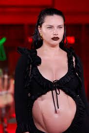 Adriana Lima Returned to the Runway Bump-First | Glamour