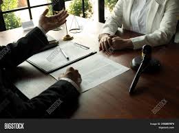 The attorney will develop relationships with clients. Lawyer Working Image Photo Free Trial Bigstock