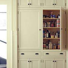 A silver leaf finish with a light antique stain outfits the doors and base for a subtle shimmer, while a dark honey. Shallow Depth Cabinets Houzz