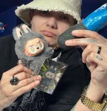 Personalized tattooed labubu auction in Baltimore