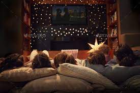 Find incredible movies and shows to watch. Family Enjoying Movie Night At Home Together Home Movies Family Movie Night Movie Night