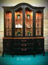 I gave it a classic farmhouse style finish in a graphite and country grey with hints of dark wax. French Provincial China Cabinet In Lamp Black Farmhouse China Cabinet Refurbished Furniture Furniture Makeover