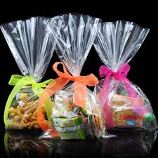 Actualmente el celofán ha sido sustituido por el polipropileno, que es un derivado del petróleo ya se trata de una bolsa fina, elegante y que tiene infinidad de usos: Amarillo Celofan Cono Bolsas Dulces Regalos Fiesta Bolsas Favorece Libre Twist Lazos