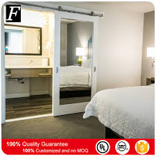 The bathroom door was taken from a nh sheep barn. China Forever Young Hampton Inn Mirrored Sliding Barn Door For Bathroom And Closet China Wooden Door Sliding Barn Door