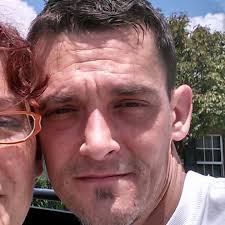 If someone you know has not been added to the page I usually wait for the  inner family to post first out of curtesy and or family friends closer to  them with