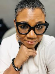 Women running in ghost face masks at park