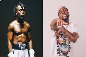 Sensational singers, burna boy and wizkid are said to have a nasty fight while partying at a club in ghana. 698js2nkrk Gkm