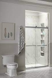 Above are pictures of my design of a small 5 ft x 8 ft bathroom remodeled into a shower only bathroom with seating, recessed can lighting, window (option), kohler clear frameless shower door, large hidden shampoo shelf, diagonal ceramic tile floor, under floor heating, ada toilet elongated, granite tile inserts in accent strip and dual shower. Shop Kohler Big Deal Event At Lowes Com Bathroom Remodel Master New Bathroom Ideas Master Bedroom Bathroom