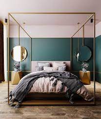 This green room feels super bright, yet still so cozy with a muted shade of green on the walls. This Gorgeous Gold Four Poster Bed Is Undeniably The Centre Piece Of This Bedroom Gold Accessories Com Bedroom Trends Minimalist Bedroom Design Bedroom Decor