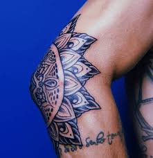 This black and gray piece is totally amazing, creepy and cold, and absolutely one of a kind. Mandala Knee Tattoo Spiritual Designs Round The World Magazine