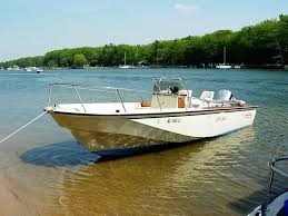 My 1985 Boston Whaler Outrage At Rest On Pigeon Lake Port Sheldon Mi Photo Credit C Jeff Rohlfing 5 2006 Boston Whaler Whalers Boat Stuff