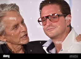Michael Douglas and Cameron Douglas attend the Premiere of Disney and  Marvel's 'Ant-Man And The Wasp'