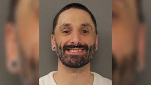 Man Charged With Assault After Allegedly Flipping Bed, Attacking Father  During Protective Order Dispute