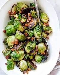 Place brussels sprouts in a serving dish and toss with the toasted almonds and the shaved parmesan cheese. Maple Balsamic Glazed Roasted Brussels Sprouts With Pancetta By Foodiecrush Quick Easy Recipe The Feedfeed
