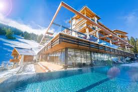 The transparent bottom pool suspended in the the five story einstein fitness park building in switzerland. Best Villas And Hotels With Infinity Pools For Winter Retreats Infinity Pools