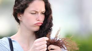 AITA for snapping at my friend for touching my curly hair while it was  drying, and ruining it?'