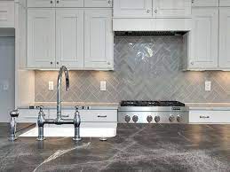 Hardwoods will never fail to be applied in any kitchen backsplash ideas although they are usually used for baseboards and floorings. 17 Grey Kitchen Backsplash Ideas That Leave You Awestruck Trendy Kitchen Backsplash Chevron Kitchen Kitchen Remodel